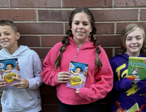 Schools install book vending machines to promote literacy